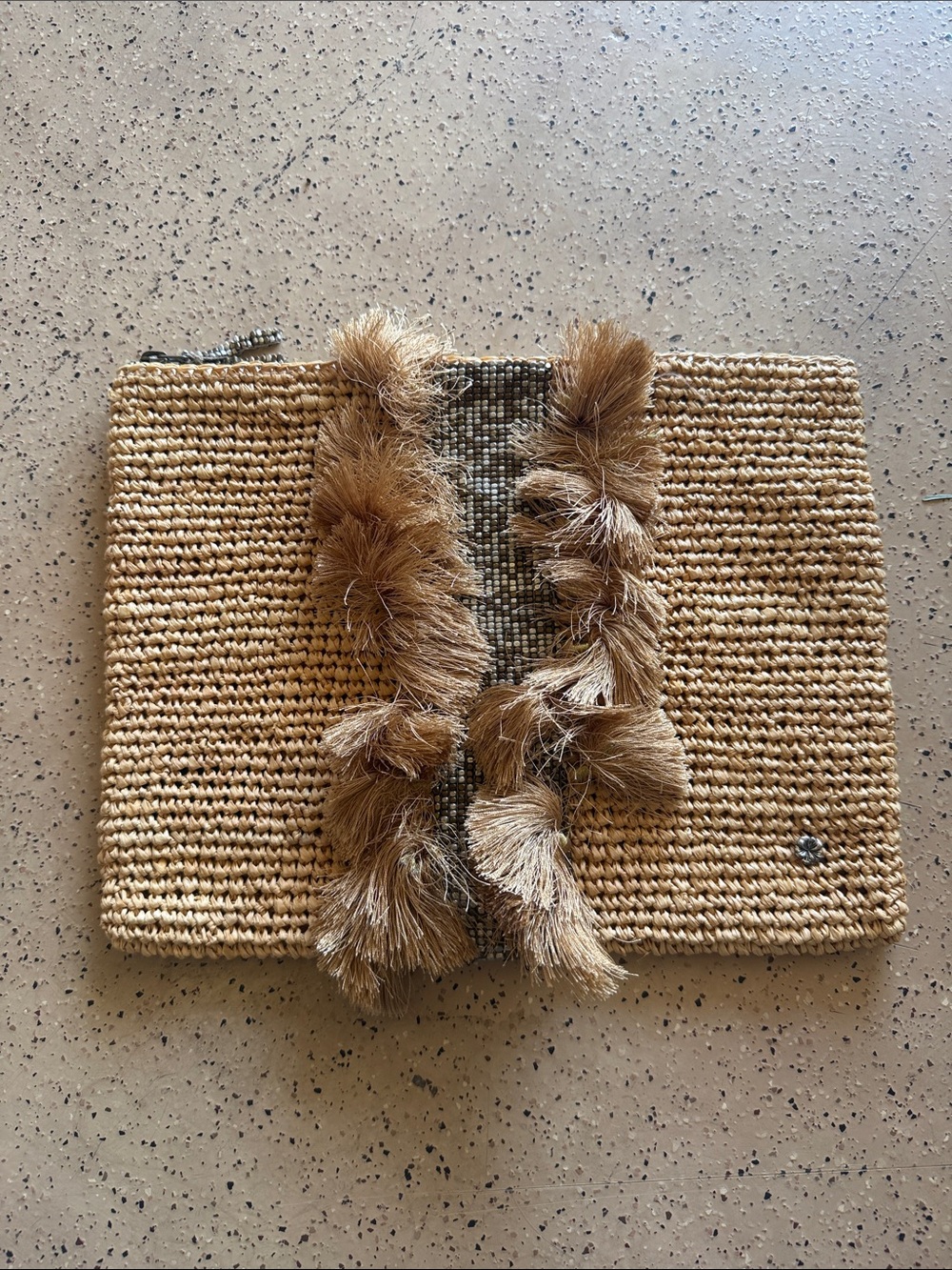 Textured Woven Tassel Clutch in Natural Brown